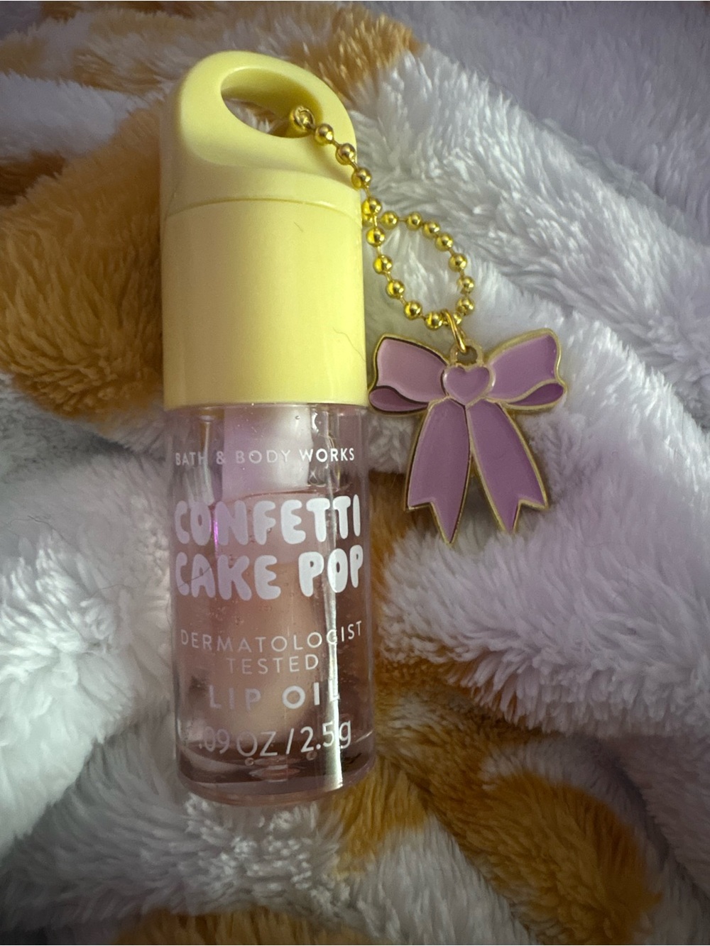 Bath & Body Works Confetti Cake Pop Lip Oil with Yellow Cap and Pink Bow Charm